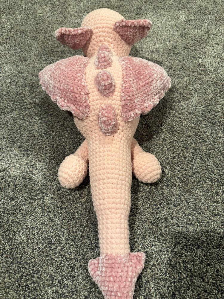 back top view of the dragon crocheted plushie