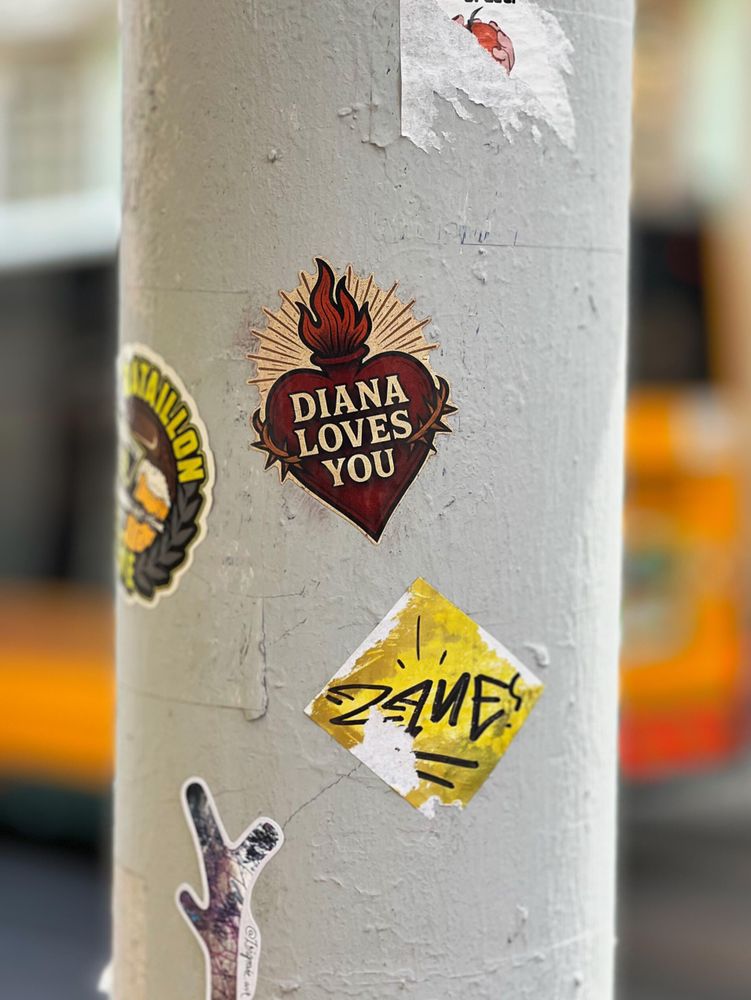 "Diana Loves You", in a flaming heart sticker.