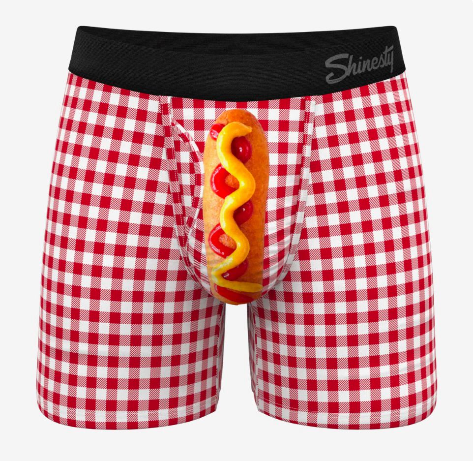 a pair of red and white checked boxers with a corn dog on the penis part