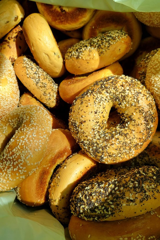 Various bagel flavors in a large bag