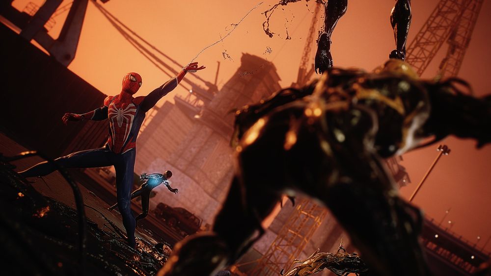 Spider-Men in sunset fighting symbiotes