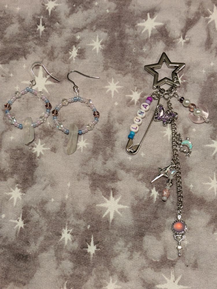 a pair of beaded circle earrings and a bead/charm keychain on a star clasp