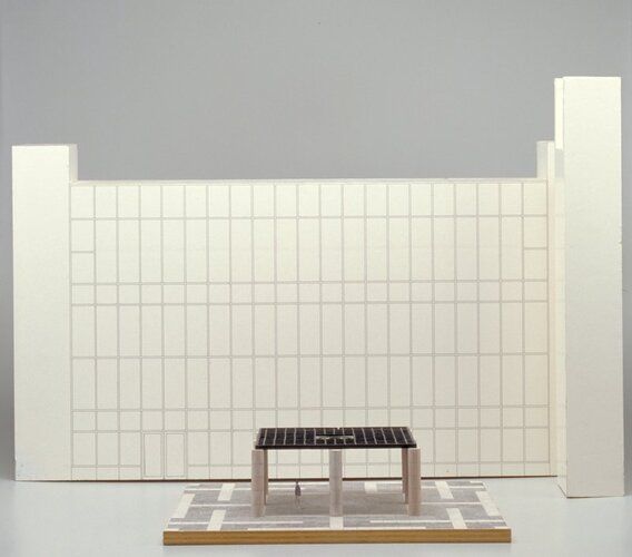Model of pavilion with person inside; six small painted wood squares are completely removable; model of MIA glass facade with windows drawn in felt-tipped pen