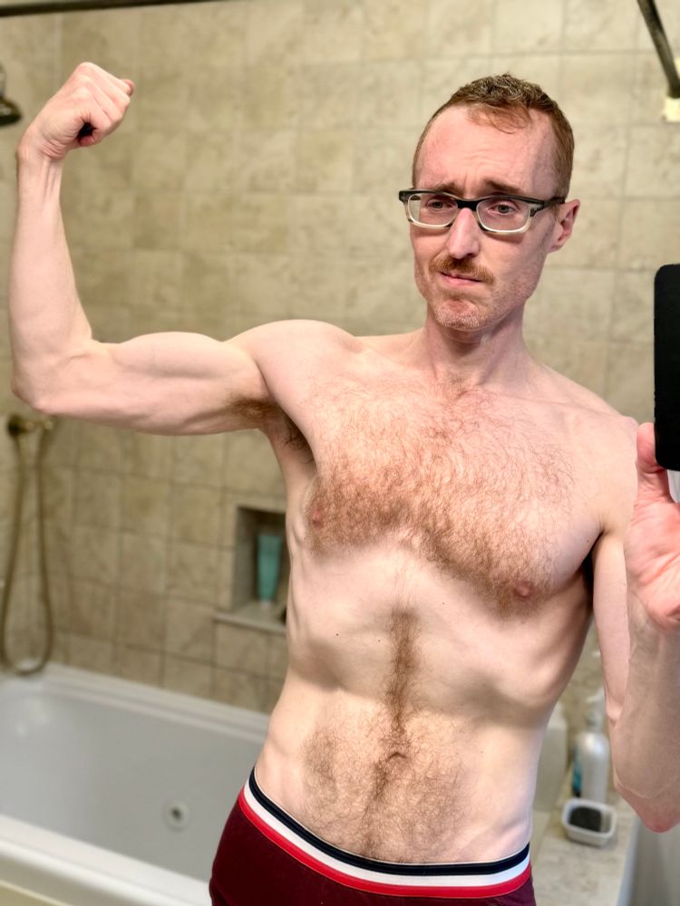 Me, scrawny and making a stupid face. 

At least the bathtub’s clean.