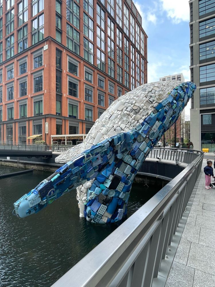 The Whale on the Wharf installation at Canary Wharf. A large blue and white whale made from plastic discarded into the world’s oceans.