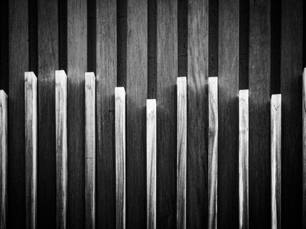Alternating dark and light wood slats on an exterior wall at Denver Union Station.