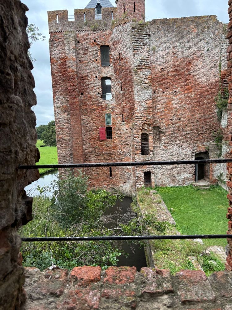 Castle ruins, seen through courtyard from another part of castle.