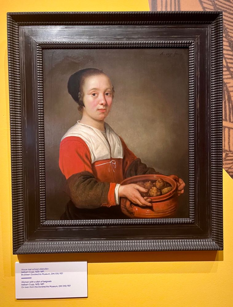 Painting of girl with a dish full of oliebollen by the Dutch artist Albert Cuyp