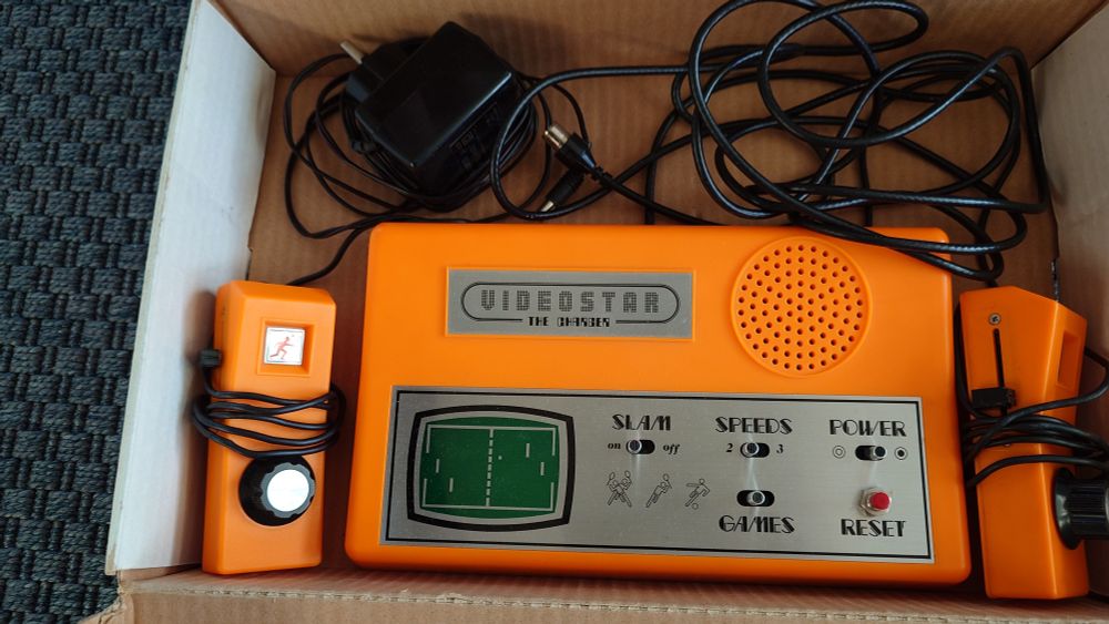 A really old school video game console from the 70's. 