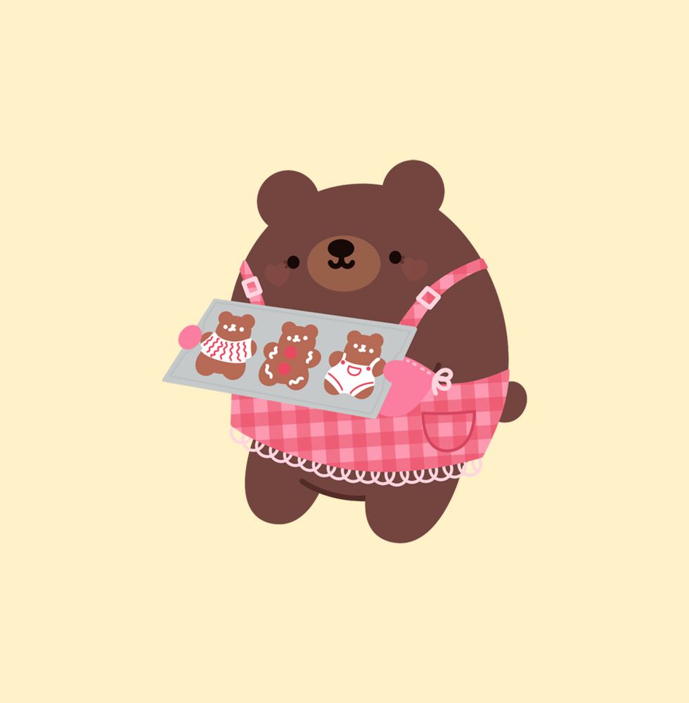 illustration of a brown bear in a pink apron, holding a tray of gingerbread cookies shaped like bears 