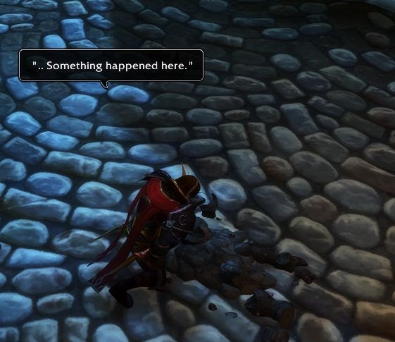 A screenshot of an elf kneeling in front of a bunch of broken rocks, presumably an Earthen corpse.