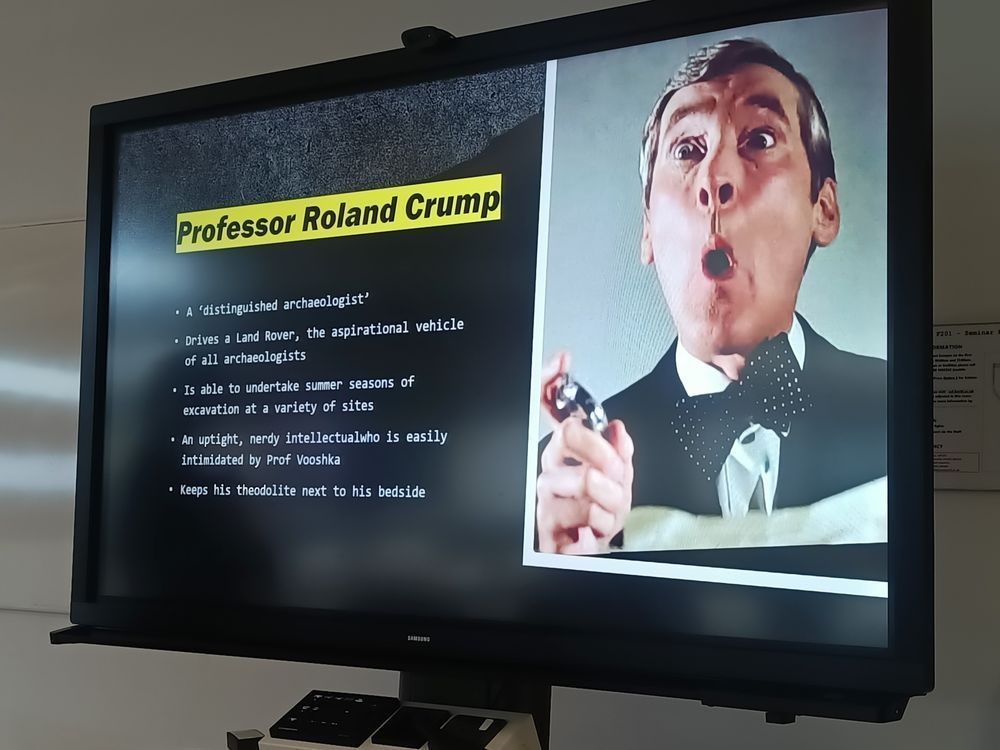 Kenneth Williams as Professor Ronald Crump in Carry on Behind