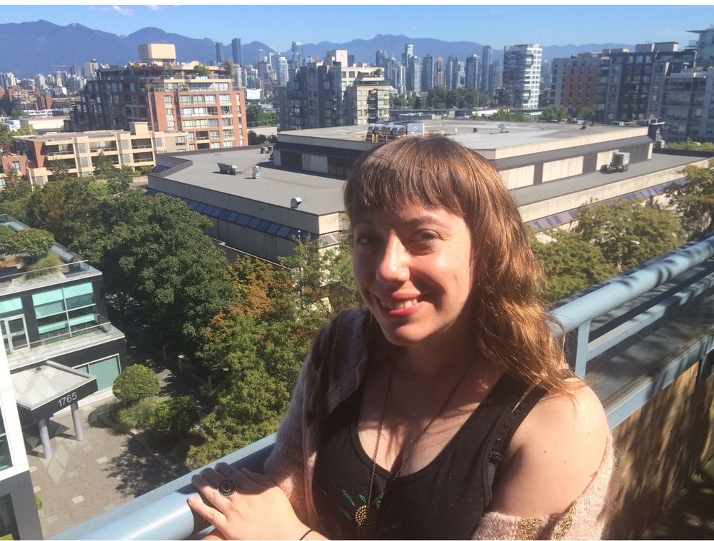 Me smiling on a sunny Vancouver day at 31 but it feels more like I have aged 31 years since then tbh 