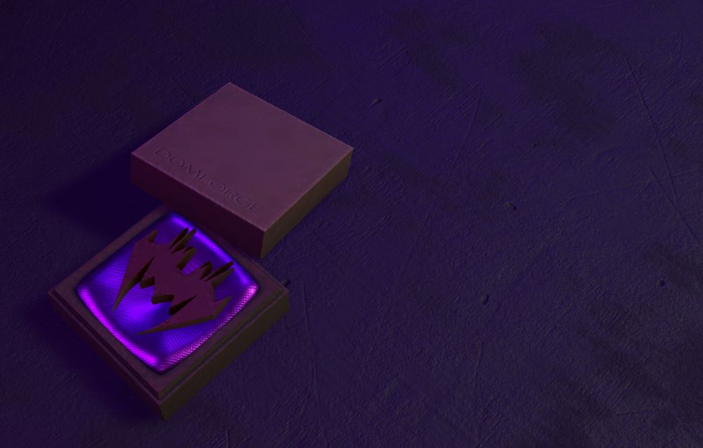 Image of a small box containing a golden DOMFORGE logo, it sits upon a satin pillow inside.