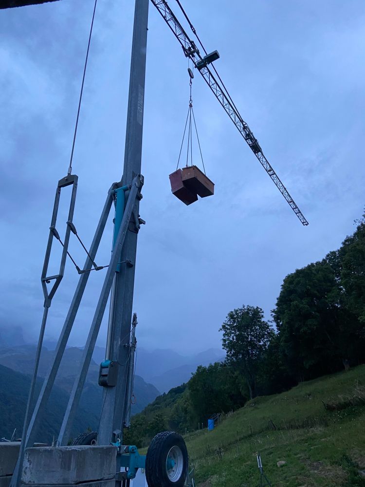Toolboxes raised up by a crane