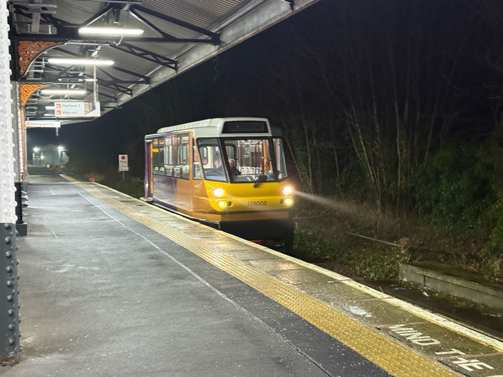 139002 waiting to depart Stourbridge Junction, for Stourbridge Town, with the orange end facing Stourbridge Town.