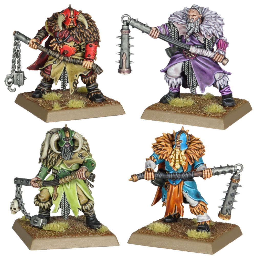 Four Warhammer The Old World Chaos Marauders in red, pinks and purples, greens, and blue and orange