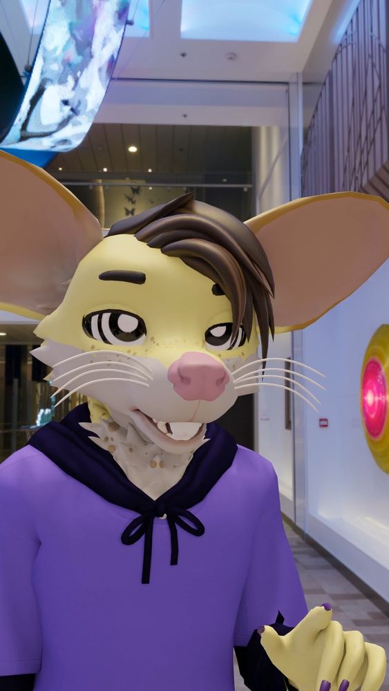 Miko in... A mall I guess? 
Hypnotized, in typical fashion. 
In a two toned hoodie, in 00's fashion.