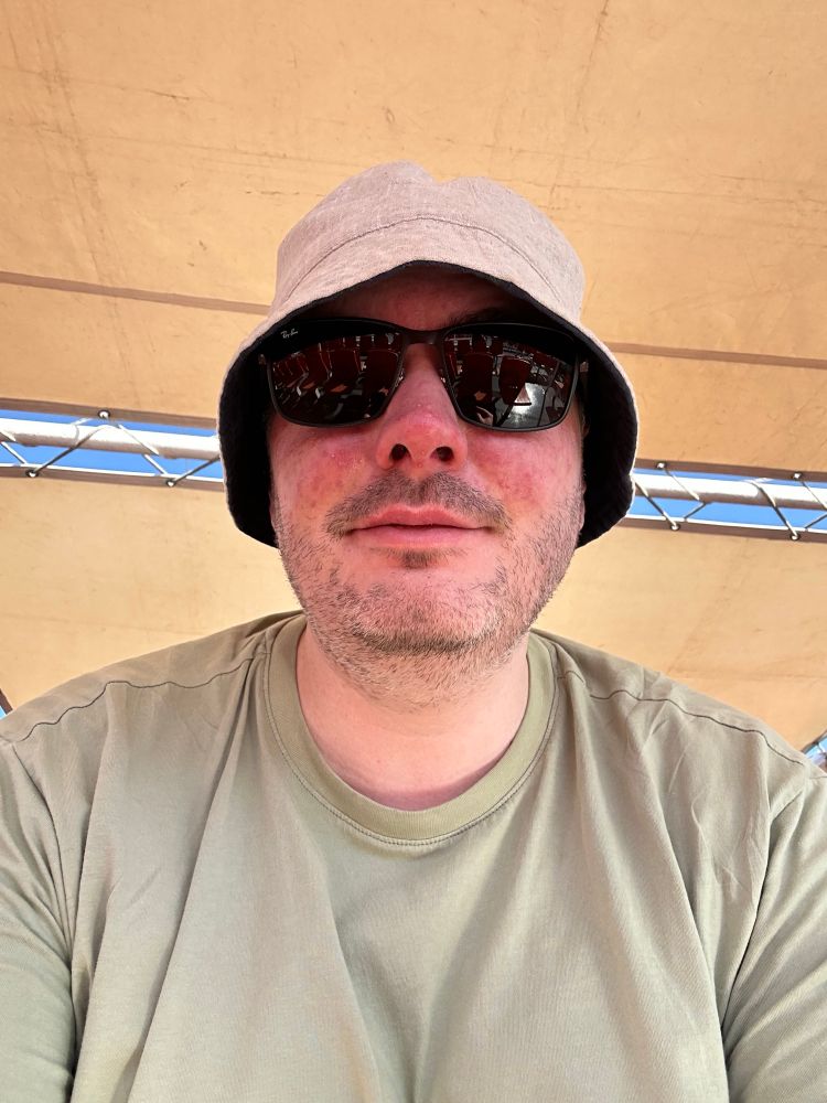 Me in a bucket hat and sunglasses 