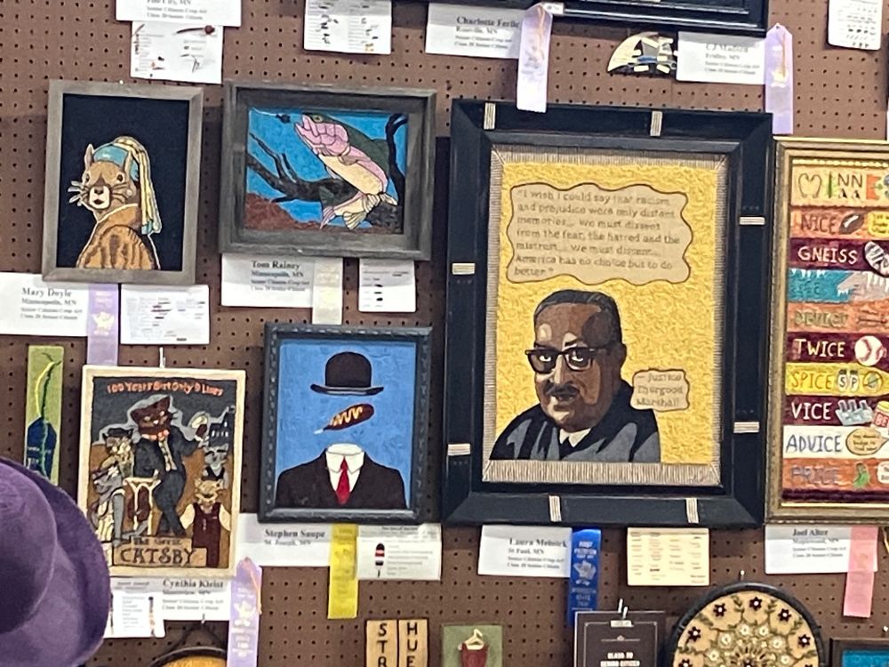 Images of art created from seeds. Some of the art are recreations of famous paintings with a State Fair twist.
