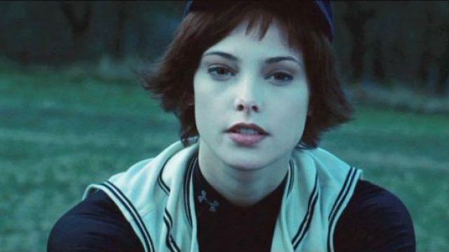 Image of Alice Cullen from the Twilight series, wearing her baseball outfit and rockin' that inexplicable but atmospheric blue filter.
