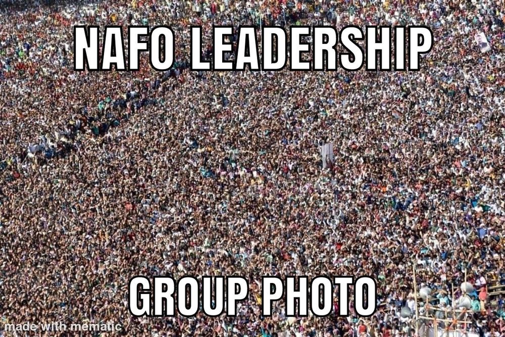 NAFO leadership group photo with a picture of a huge group of people