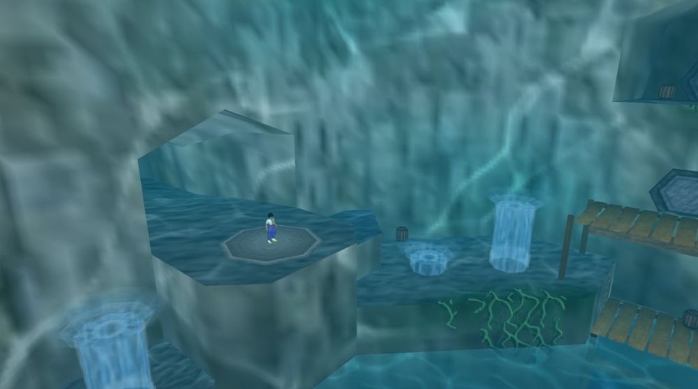 a video game showing an underground cavern with water reflecting of the walls.