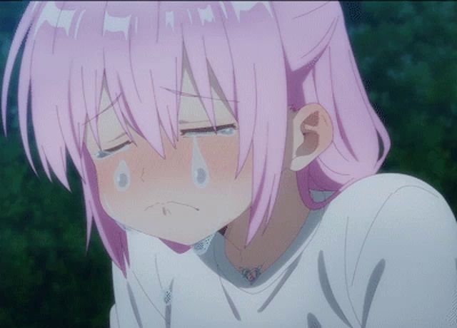 a girl with pink hair is crying with a tear coming out of her nose