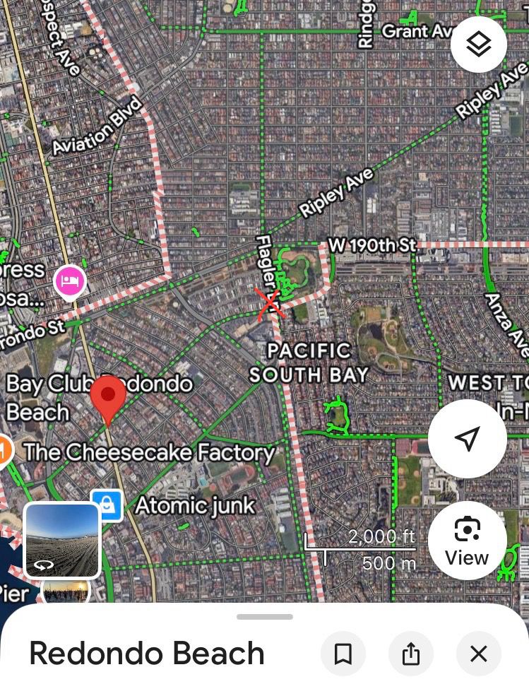 Satellite view of Redondo Beach city boundaries with a red X where the historical old city in the south barely touches the newer northern annexed area 