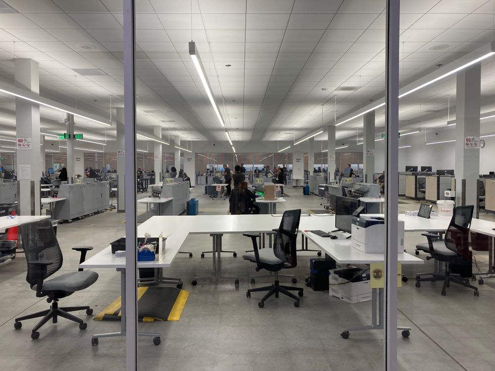 Empty tables and chairs. Workers are on a short midafternoon break (and some are home sleeping after working all night)