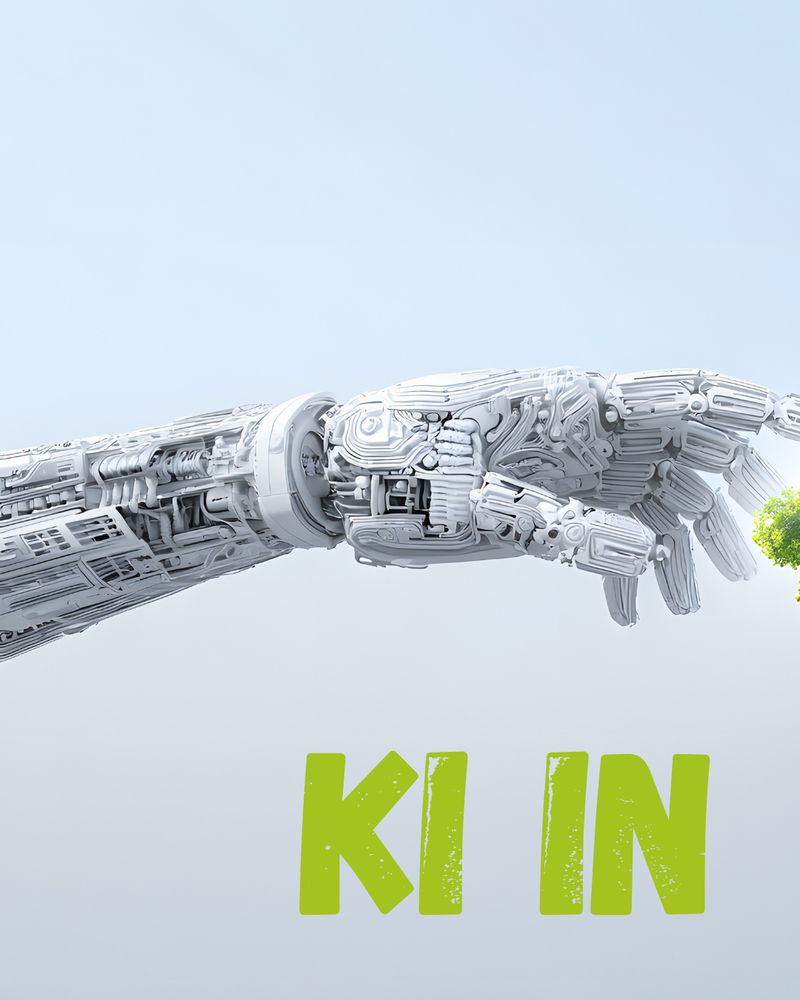 Roboterarm aus Metall und technisch detaillierten Komponenten hält einen kleinen grünen Zweig. Darunter stehen in großen, neongrünen Buchstaben die Worte „KI IN“.

