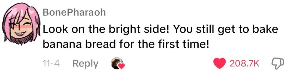 A screenshot of a TikTok comment section. Estellise from Tales of Vesperia’s face has been drawn over the icon of a user named BonePharaoh, who says, “Look on the bright side! You still get to bake banana bread for the first time!”