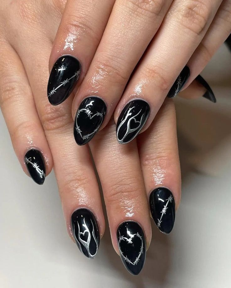 ABlsck and silver nails with hearts