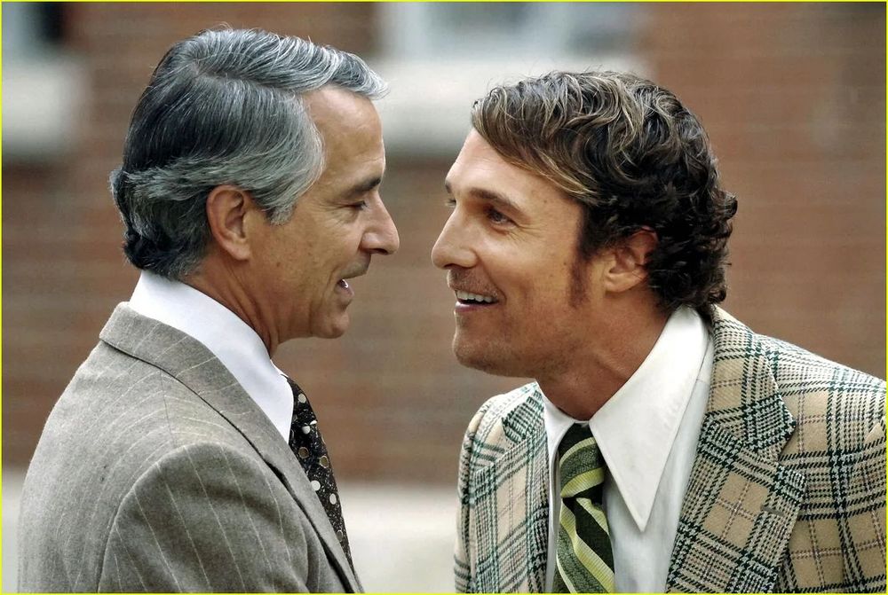 Matthew McConaughey as Jack Lengyel, wearing a very 70s plaid sportcoat and a very dopey grin, getting right into David Strathairn's face to make a point. David was playing the Marshall University acting President.