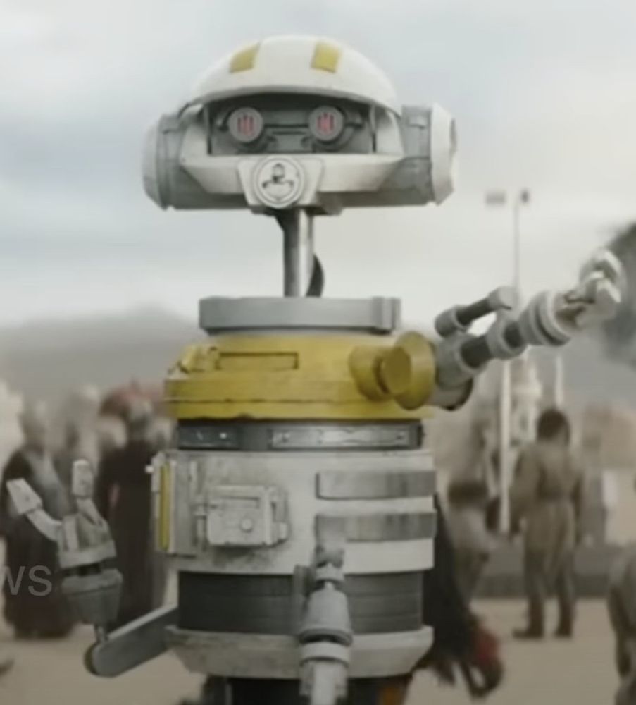 Yellow and white RX-droid from the book of boba fett