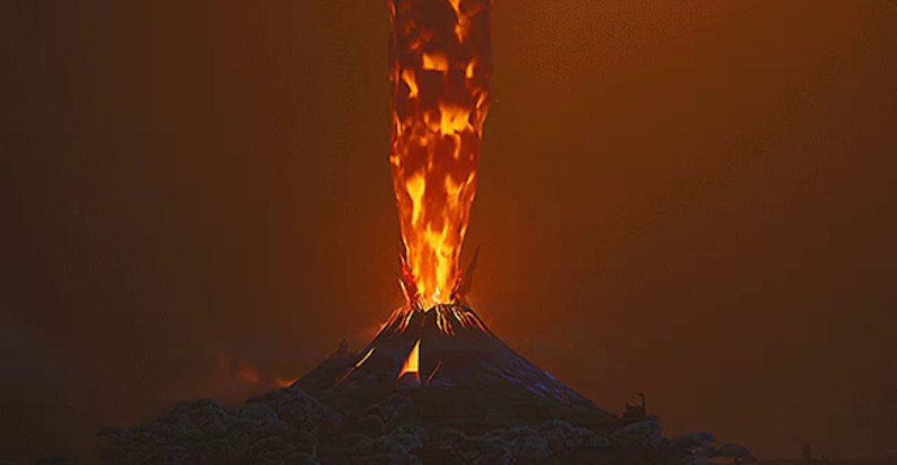 a volcano with flames coming out of it 's mouth