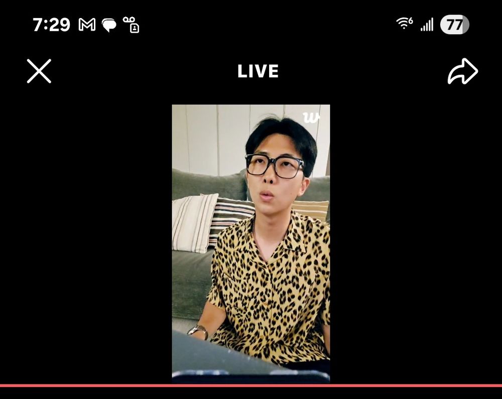 RM on weverse live stream his home with leopard print shirt and glasses