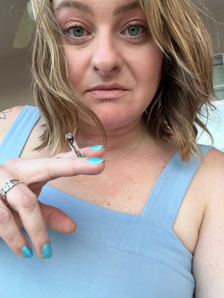 Girl in blue with joint 