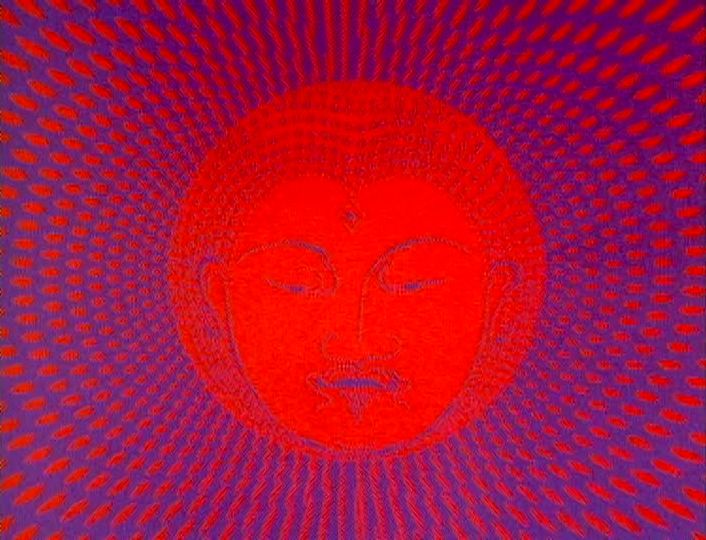 A vibrant illustration of the face of Buddha.
