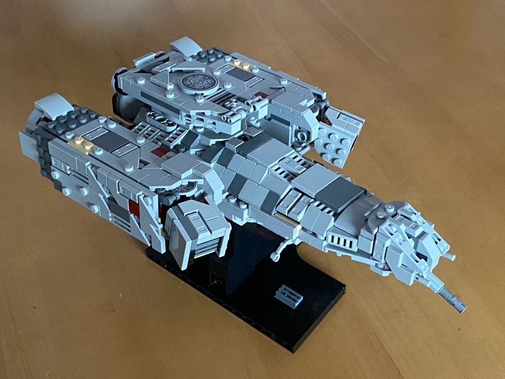 A photo showing a Lego build of the space tug Nostromo from the movie Alien.