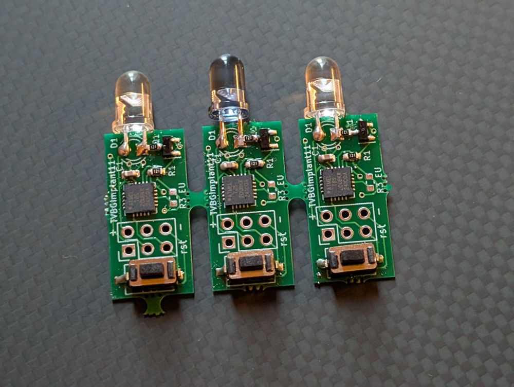 Three small infrared remote controls, for turning off televisions.