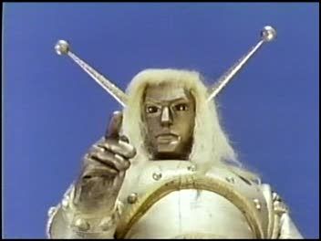 Goldar from Space Giants raises a finger as he pontificates.