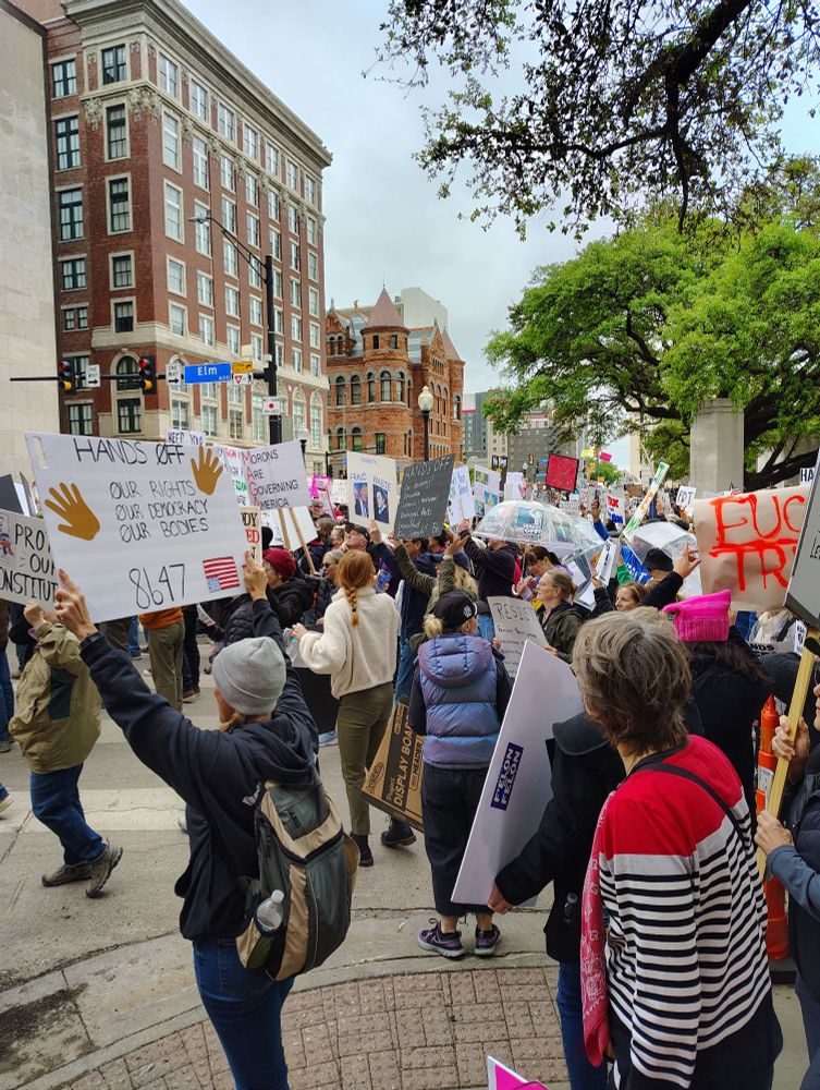 Protesters marching, Dealey Plaza, Downtown Dallas.  