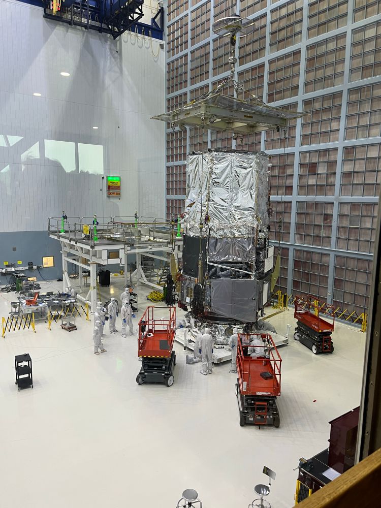 The Roman Space Telescope, without its solar array, and with a foil covering for thermal vacuum testing. 