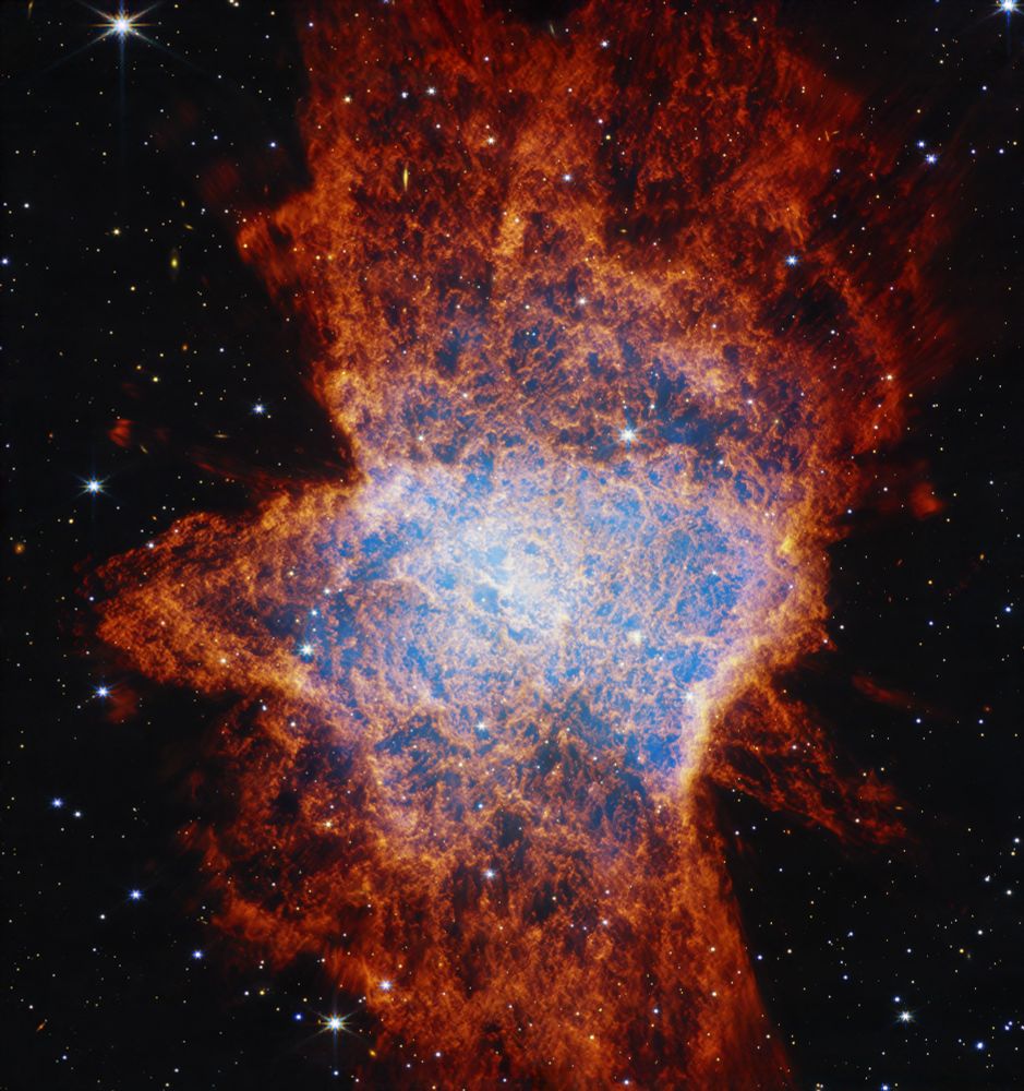 NASA’s James Webb Space Telescope’s view of planetary nebula NGC 6072 in the near-infrared shows a complex scene of multiple outflows expanding out at different angles from a dying star at the center of the scene.

There is one stretching from roughly 11 to 5 o’clock, another from 1 to 7 o’clock, and possibly a third from 12 to 6 o’clock. These outflows push gas toward the equatorial plane, forming a disk that appears to span from 9 to 3 o’clock.

Astronomers suspect there is at least one other star interacting with the material cast off by the central dying star, creating the abnormal appearance of this planetary nebula.

In this image, the red areas represent cool molecular gas, for example, molecular hydrogen.