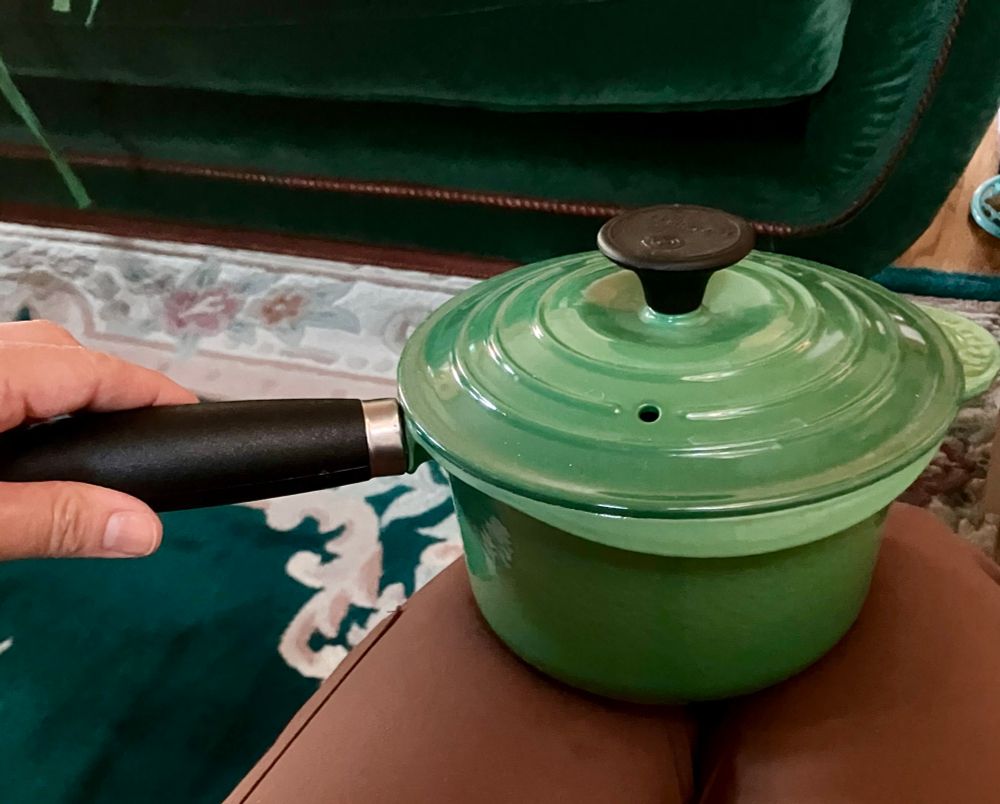 Very small and shiny green pot with lid