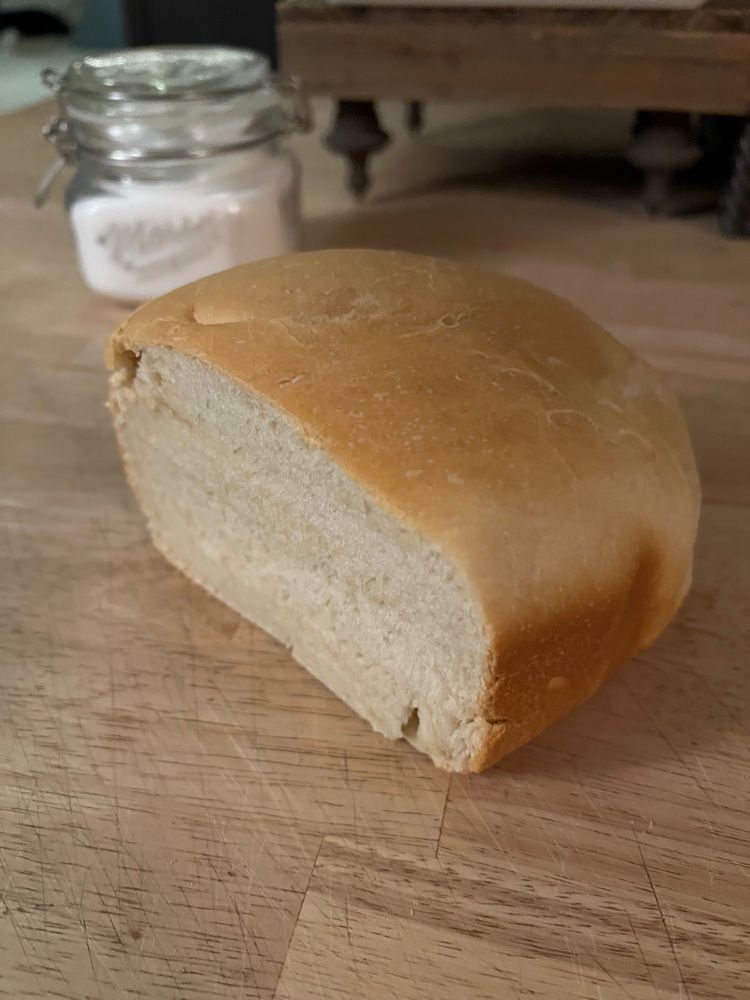 A small loaf of fresh baked bread. 