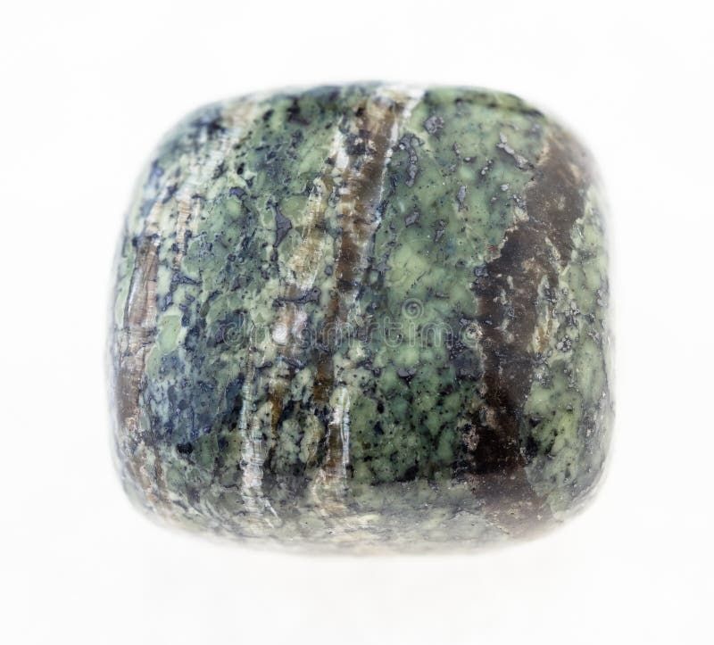 A polished section of chrysotile, which by the way is not a thing you should try to do, but it does give us a chance to see the mottled greens and whites which give the lamellar habit of the same chemical, serpentine or lizardite, its name. Dreamstime stock image