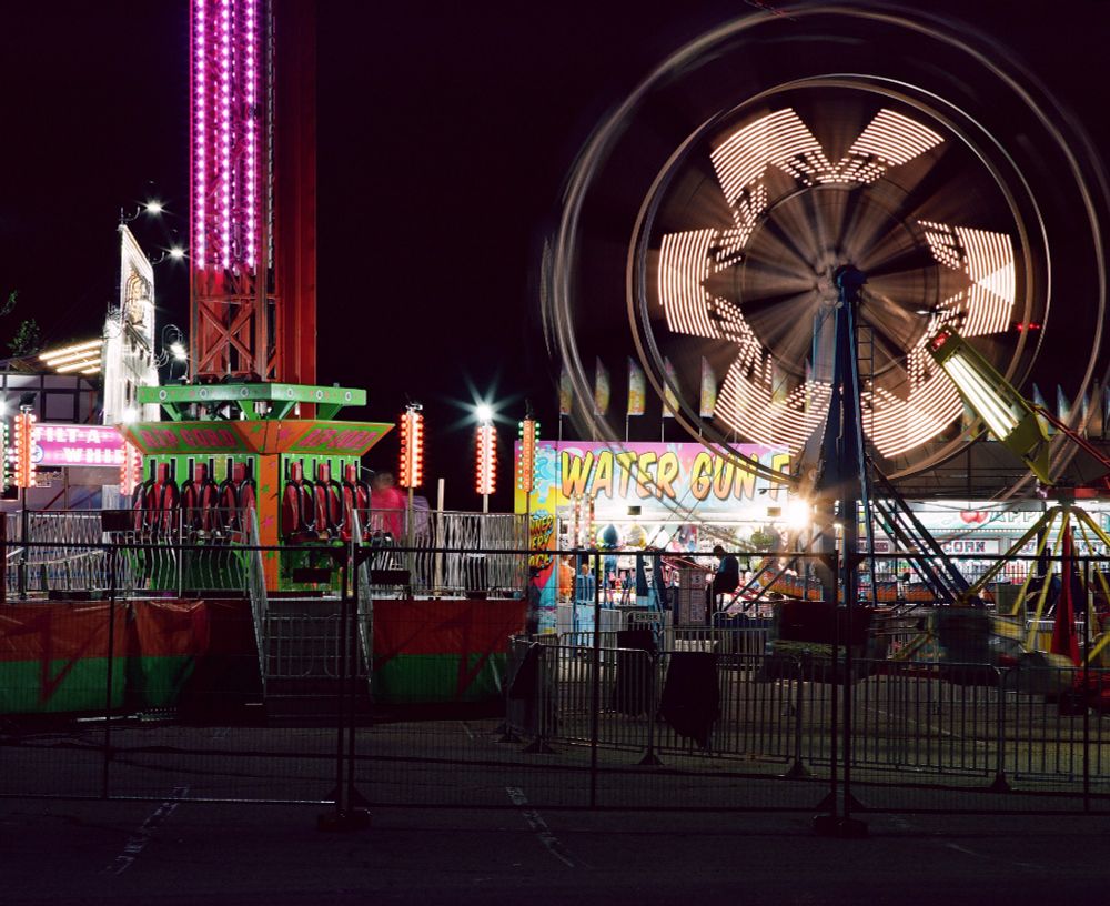 Night time long exposure of a carnival rides