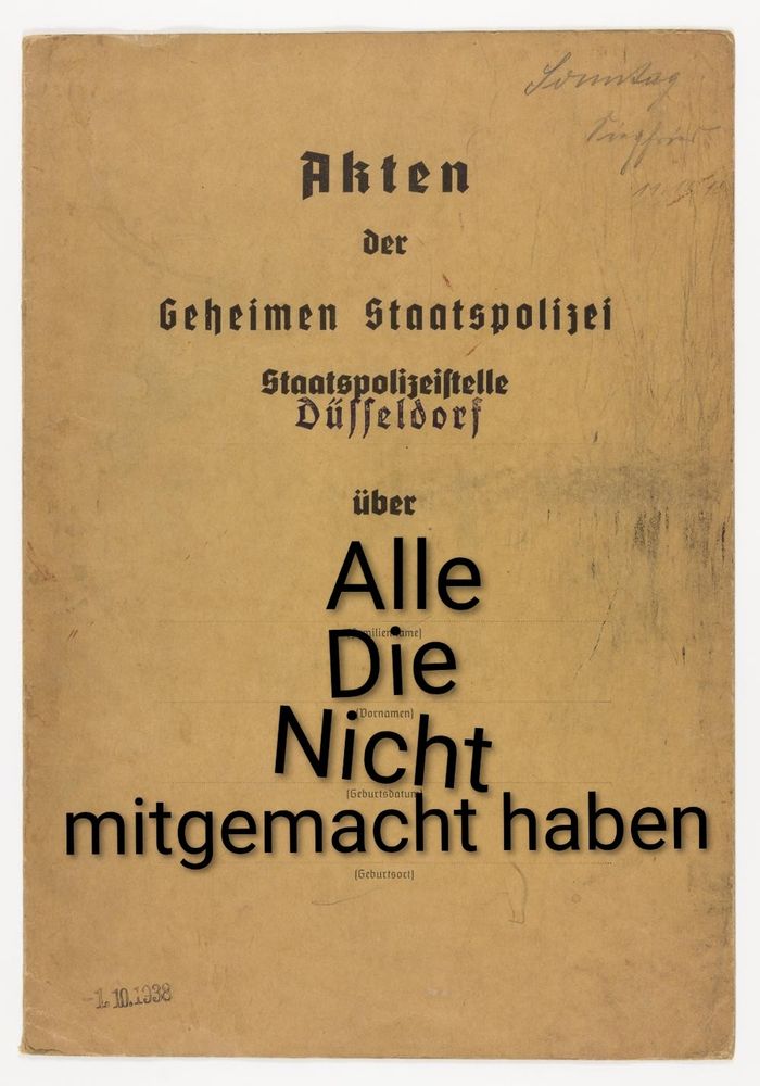 Ein Aktendeckel mit Aufschrift Akten der Geheimen Staatspolizei Staatspolizeistelle Düsseldorf über Alle die nicht mitgemacht haben
